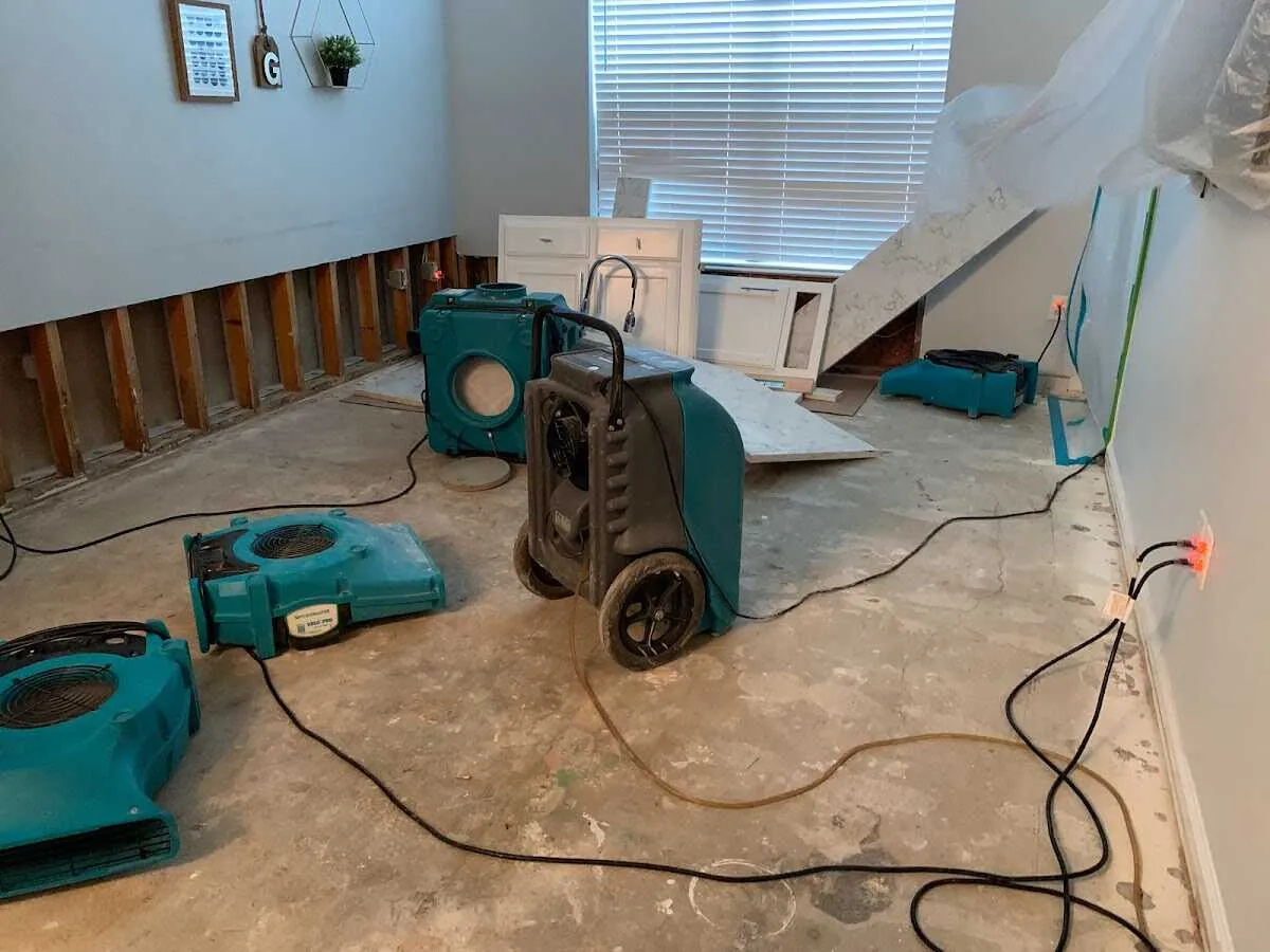 Dehumidifier in flood-cut room for Water Damage Restoration in Chaparral